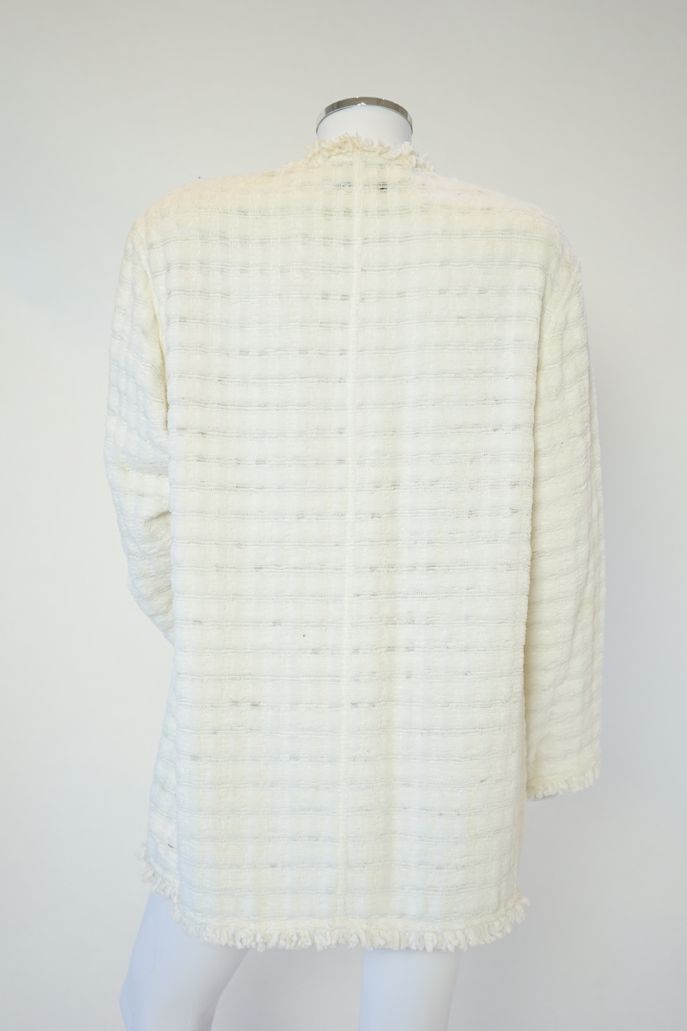 A Chanel early 1990's cream boutique jacket, size 40